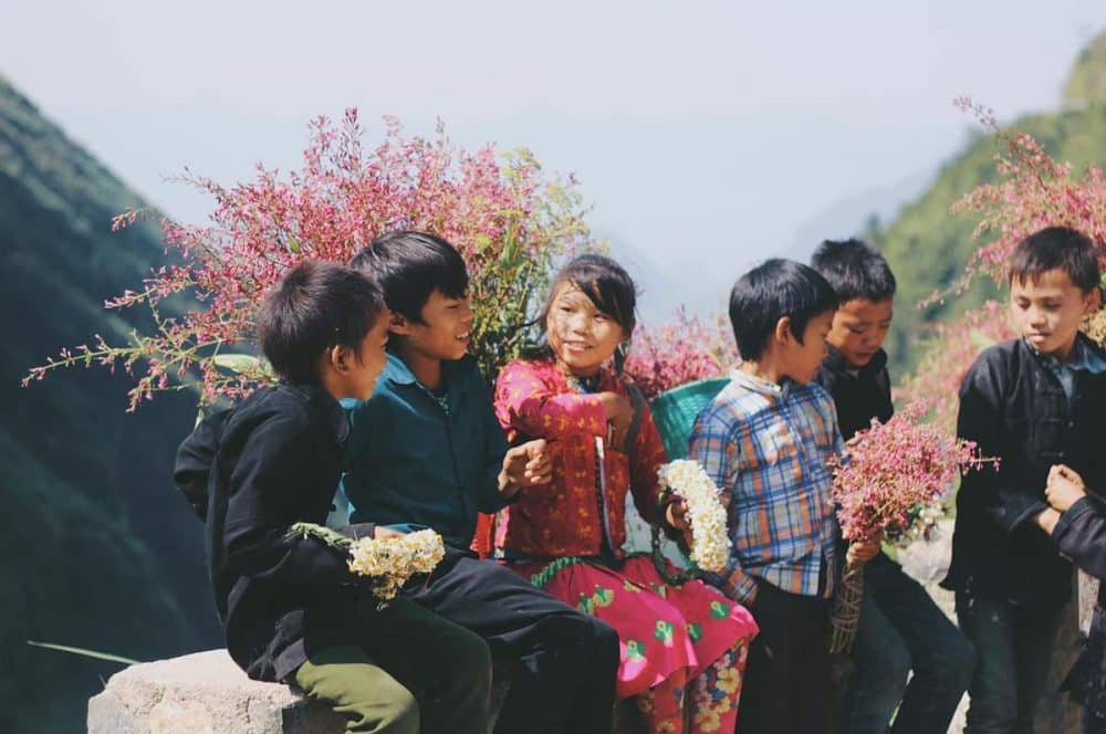 Taking photos with local children in the highlands