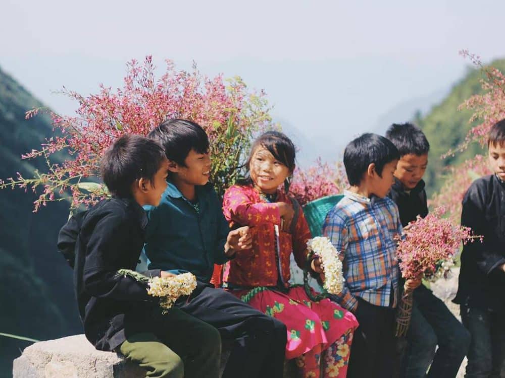 Taking photos with local children in the highlands